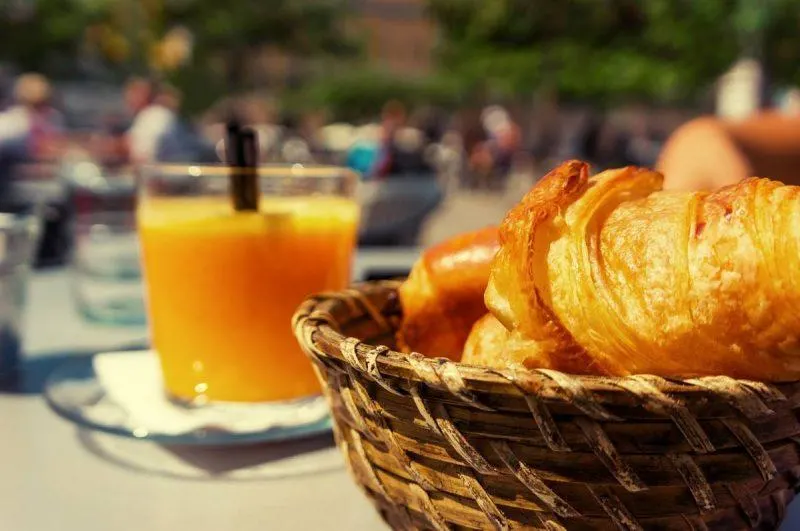 Croissants in a basket and juice