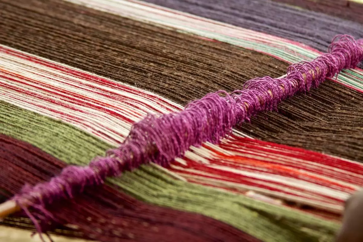 Colorful threads in a weaving machine