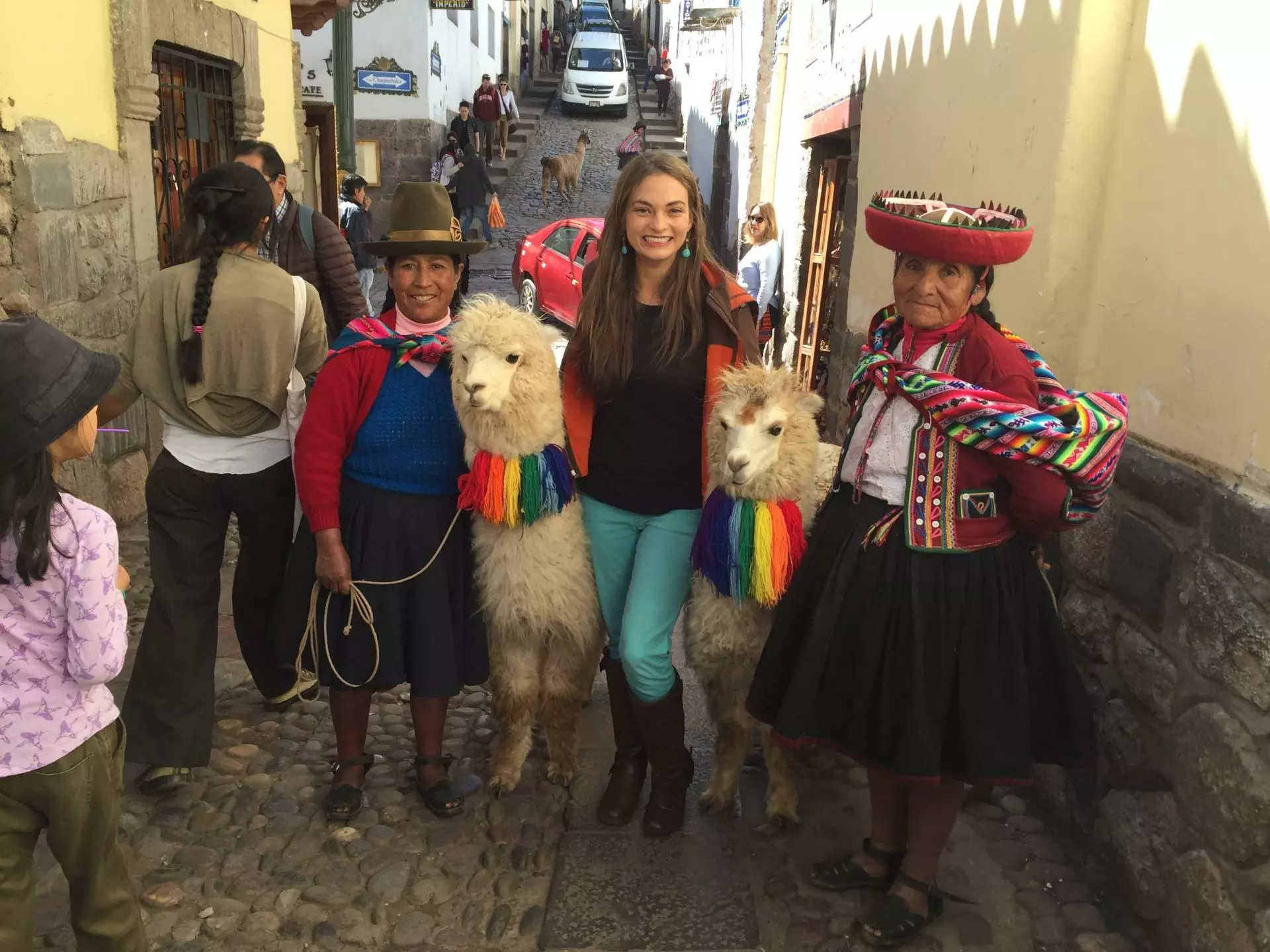 Posing with llamas in Cusco