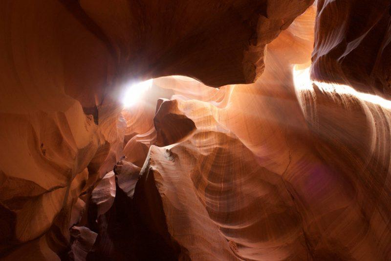 Sunbeams shining in through the slot canyon