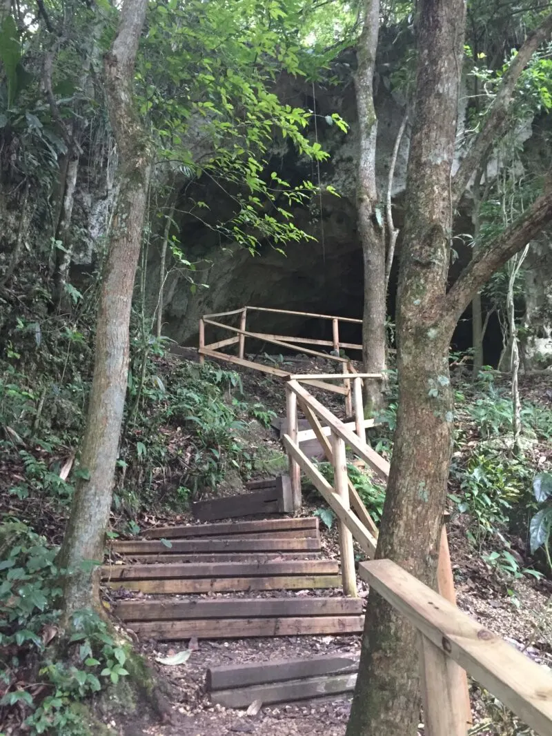 Stairs leading up to entrance of cave