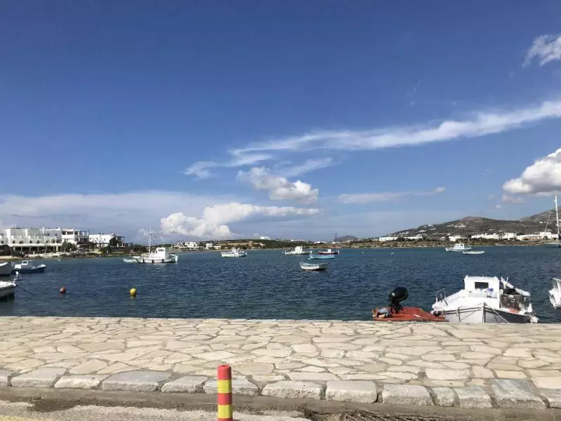 Small ships and open water at an island dock