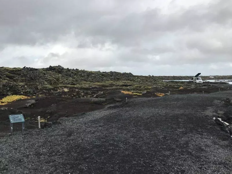 Black sand at the Blue Lagoon