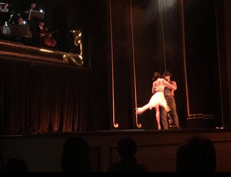 Man and woman dancing on stage