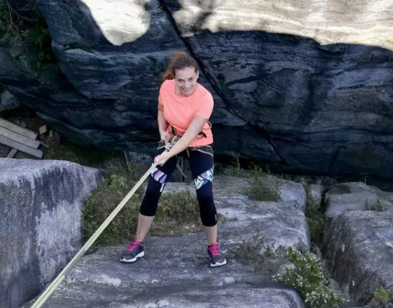 Rappelling down a mountain in Oats