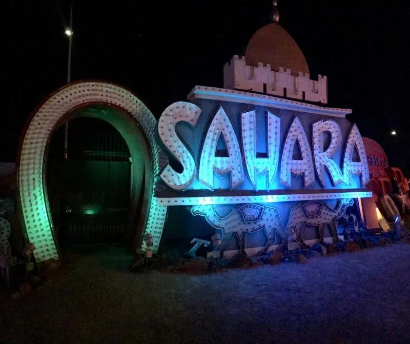 Old casino sign lit up at night