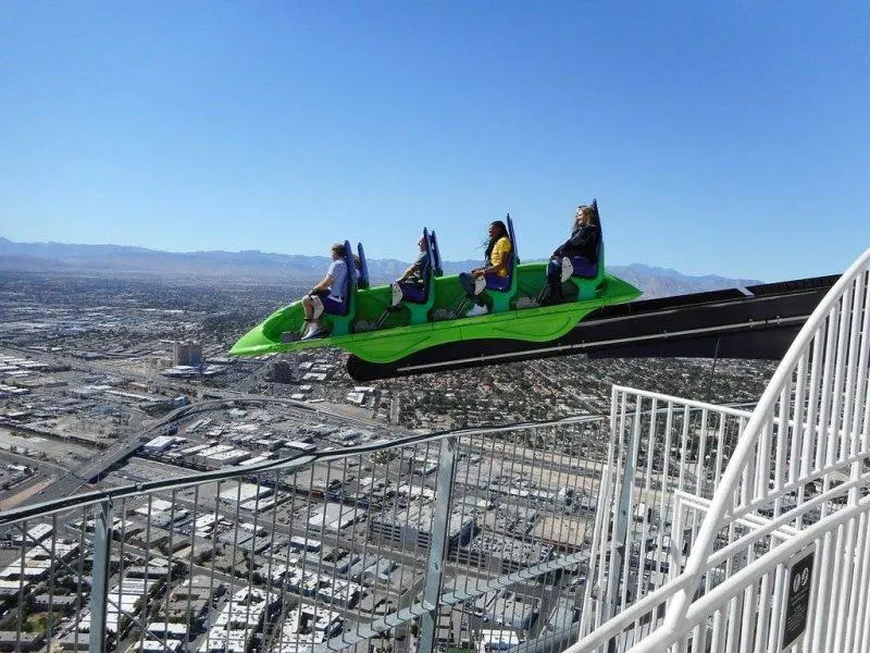 Riders dangling over the city