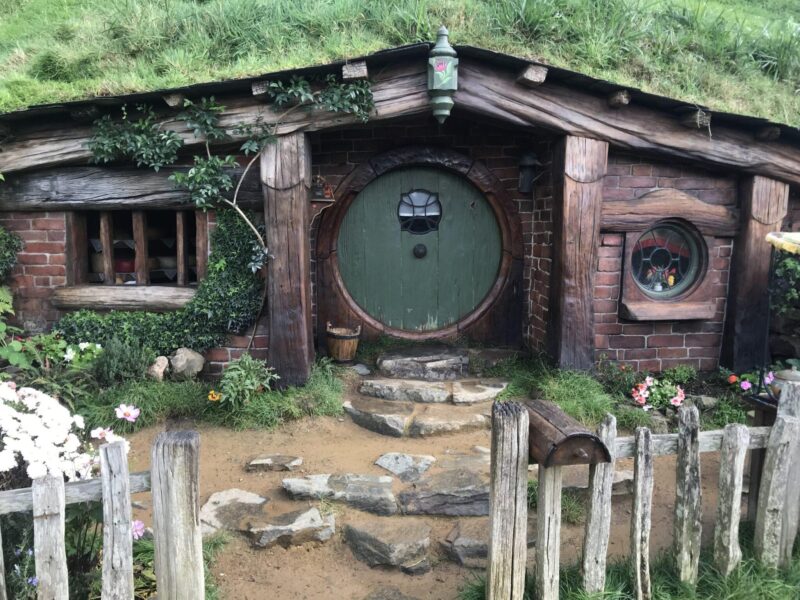 Charming hobbit house with green door