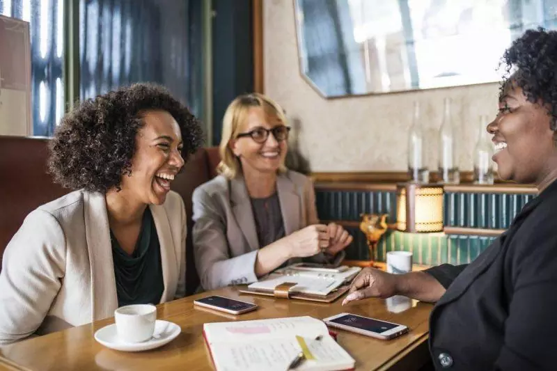 Women chatting at a table