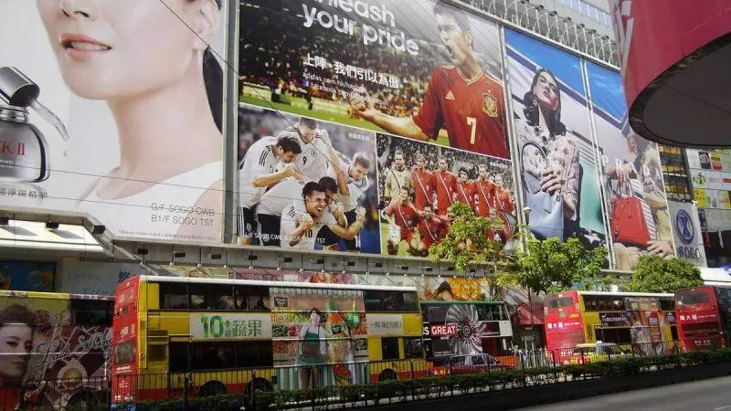 Busy city wall filled with advertisements