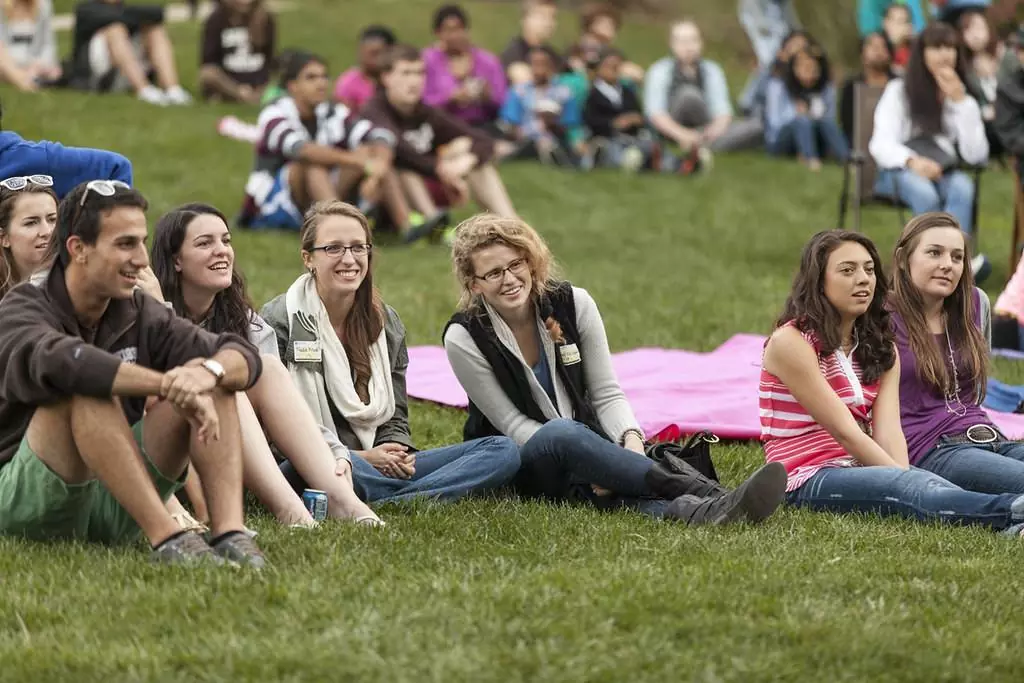 People sitting on a lawn