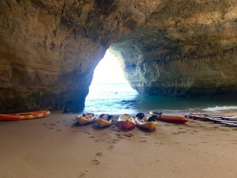 Kayaks lined up inside the Benagil Sea Cave