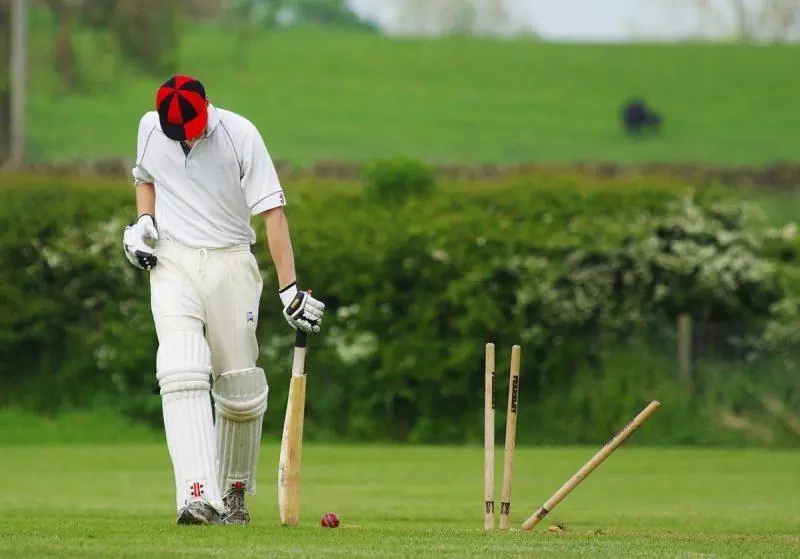 Man playing cricket