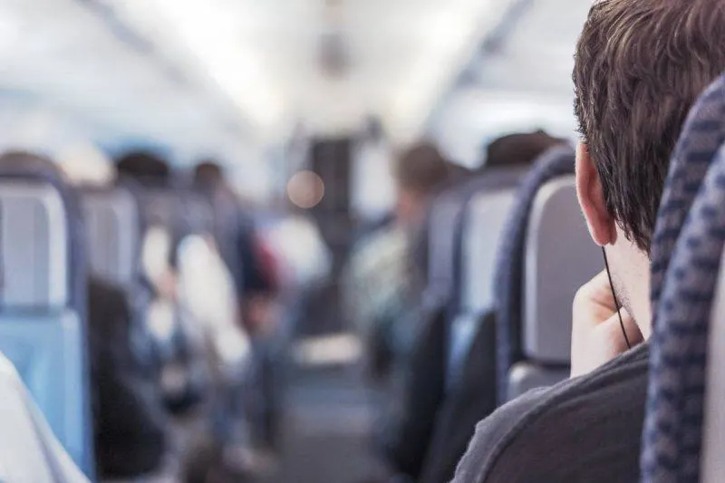 Guy sitting on an Air Transat plane