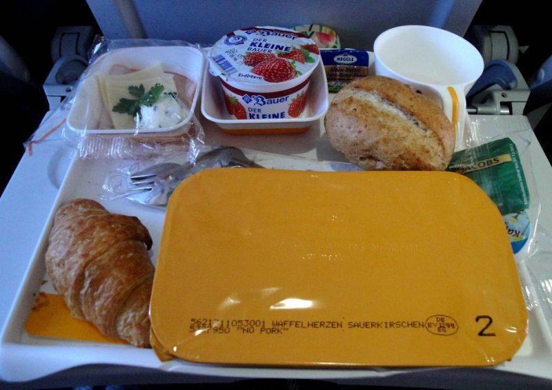 Tray filled with airline food