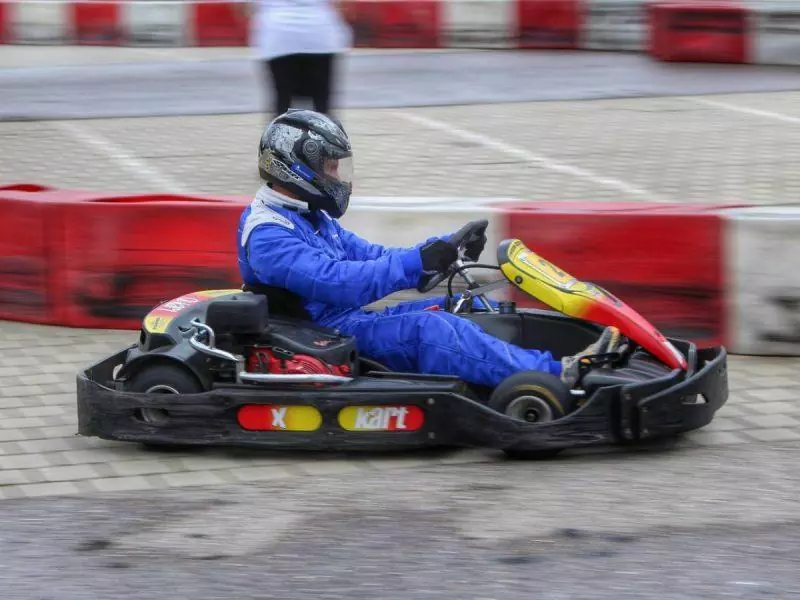 Man racing in a go-kart