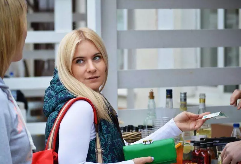 Woman paying with a credit card