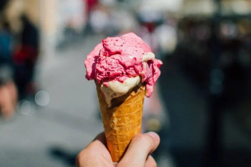 Hand holding ice cream cone