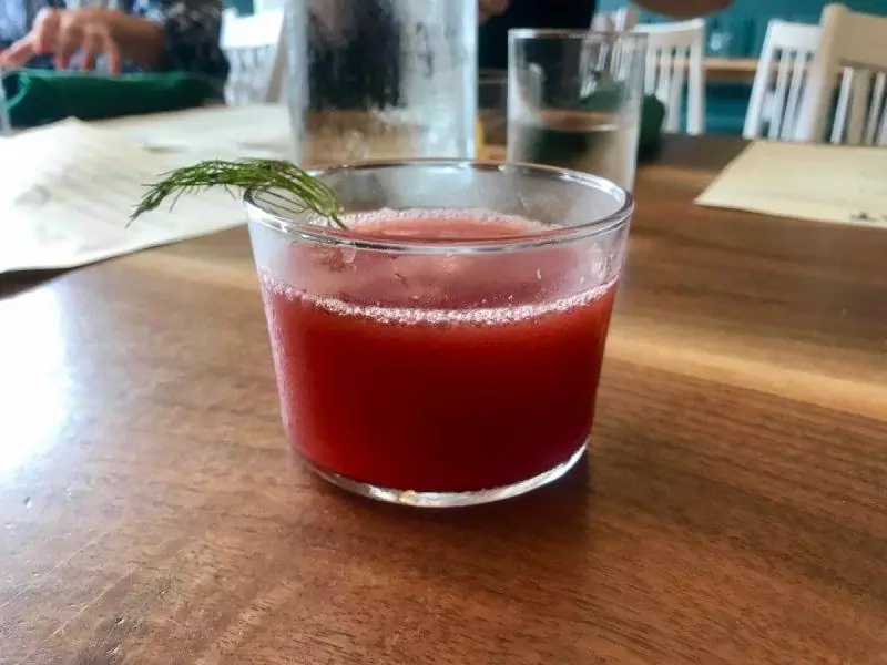 Pink cocktail drink and garnish