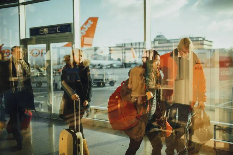 People walking in an airport terminal