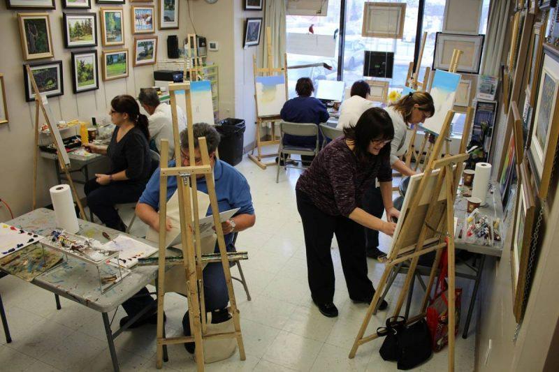 People painting in an art studio