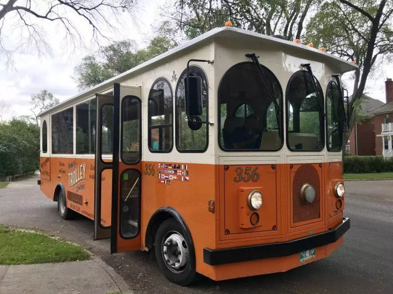 Orange and white trolley