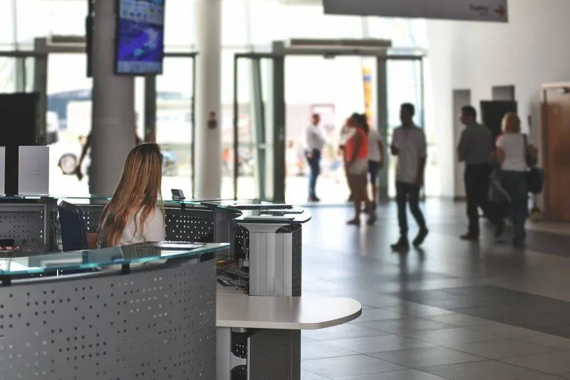 Customer service agent at table