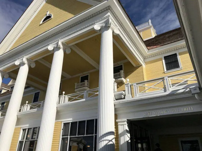 Yellow hotel with white columns