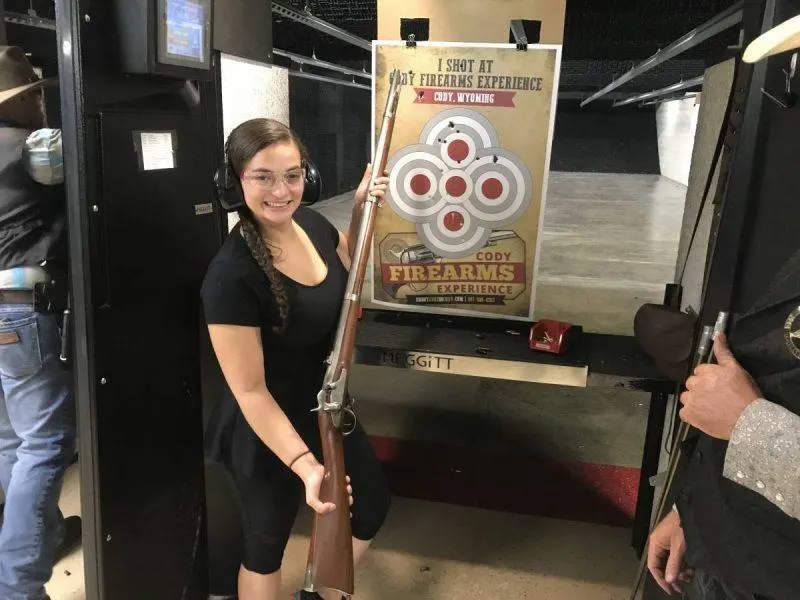 Holding a rifle at the shooting range