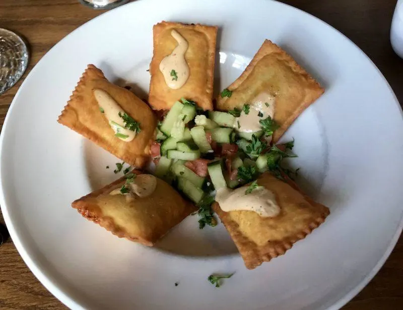 Trout ravioli on a plate