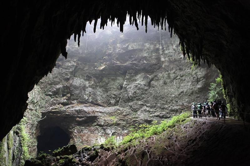 Group of people taking a cave tour