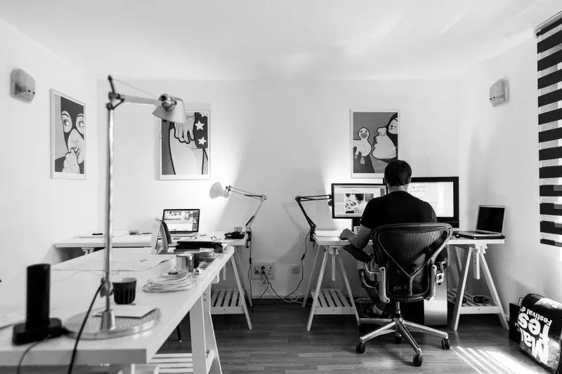 man working at his computer