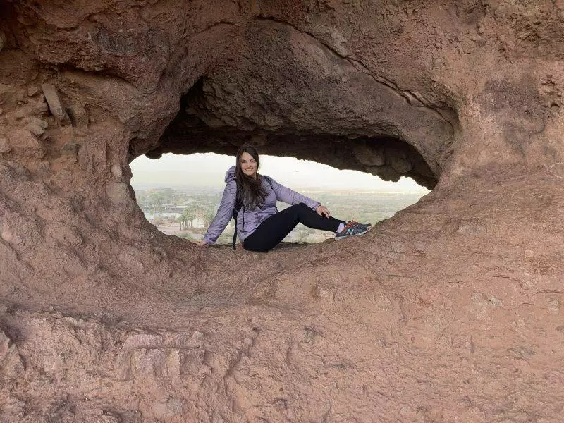 Sitting in natural hole carved into the rock