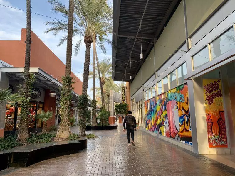 Man walking in a pedestrian mall