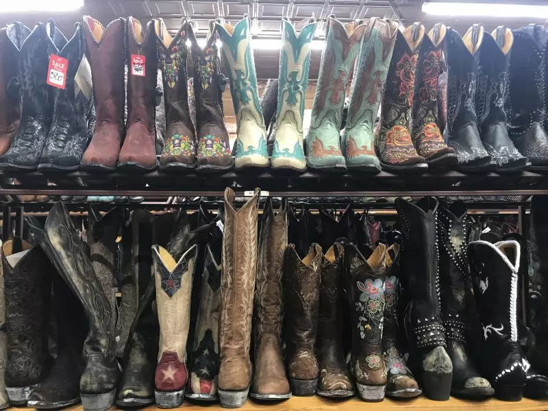 Cowboy boots on a shelf