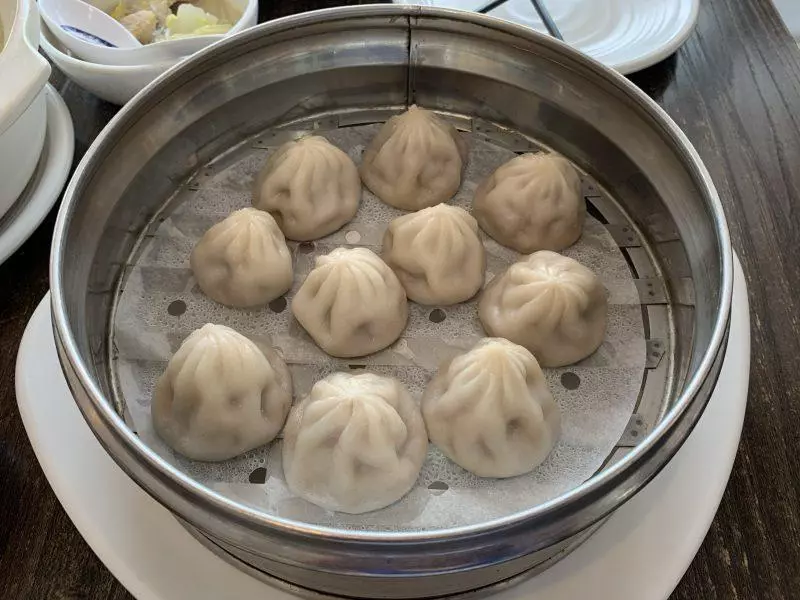 Dumplings in a tin bowl