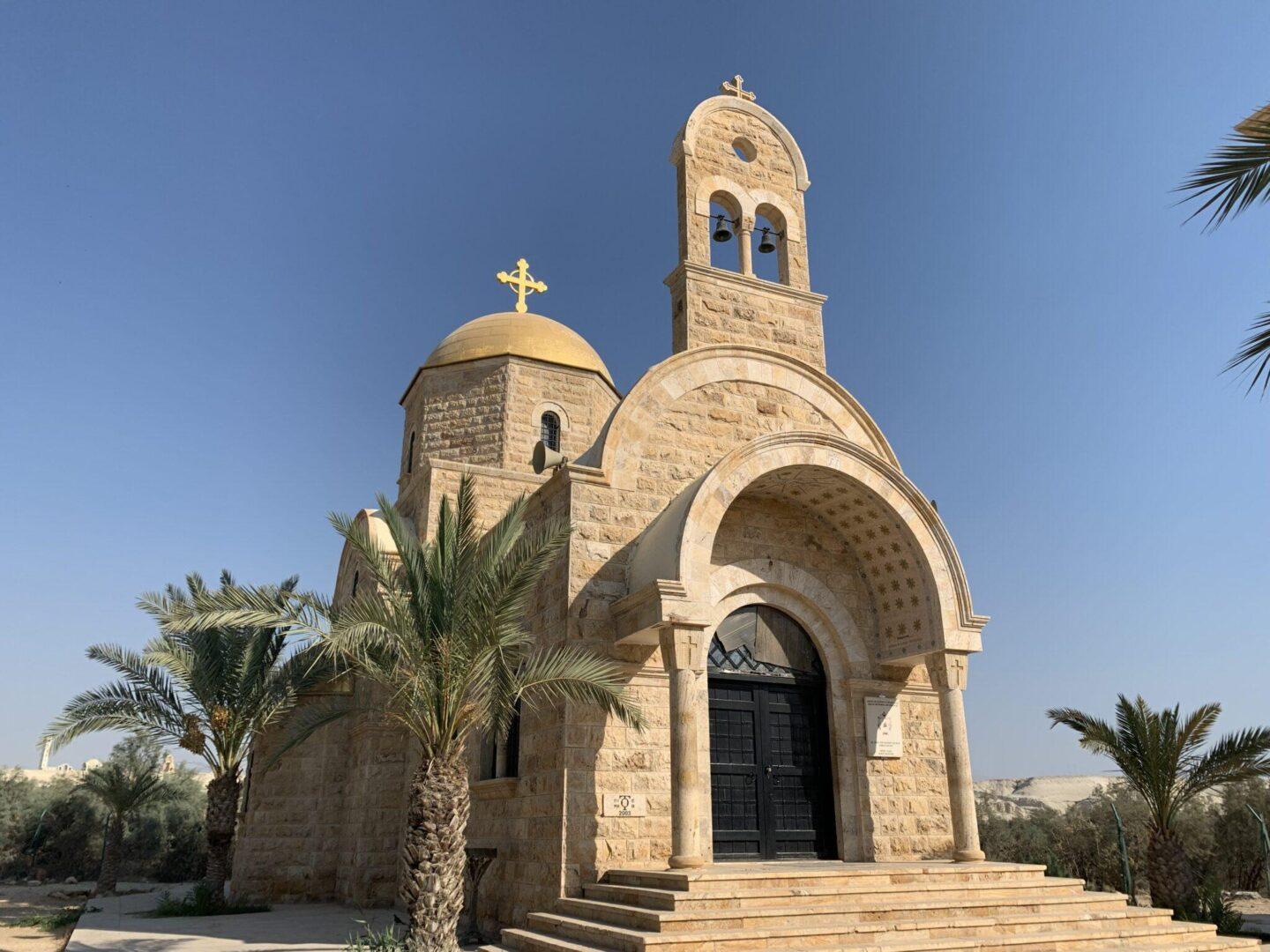 Pretty church surrounded by palms