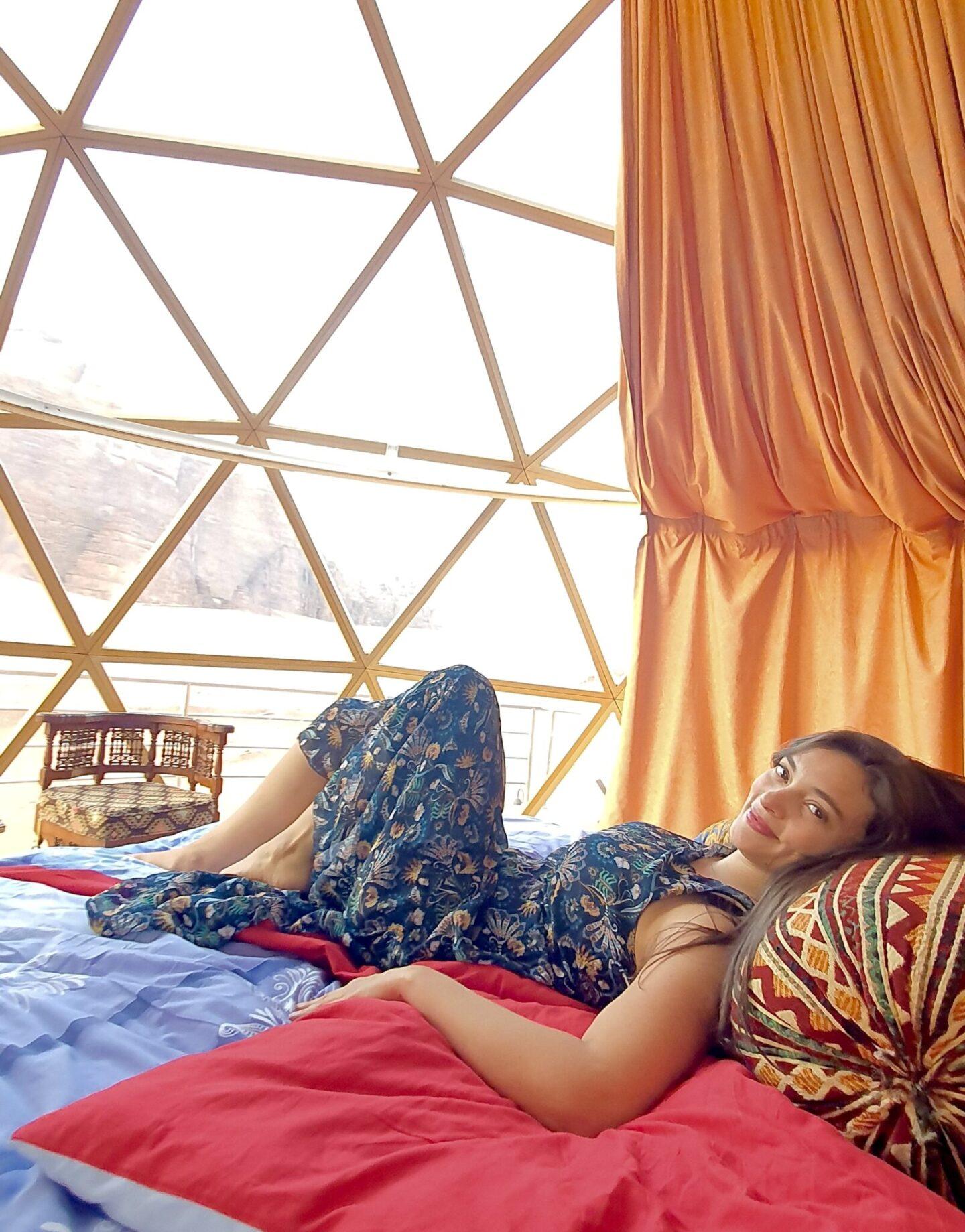 Woman in luxuriously decorated glass dome