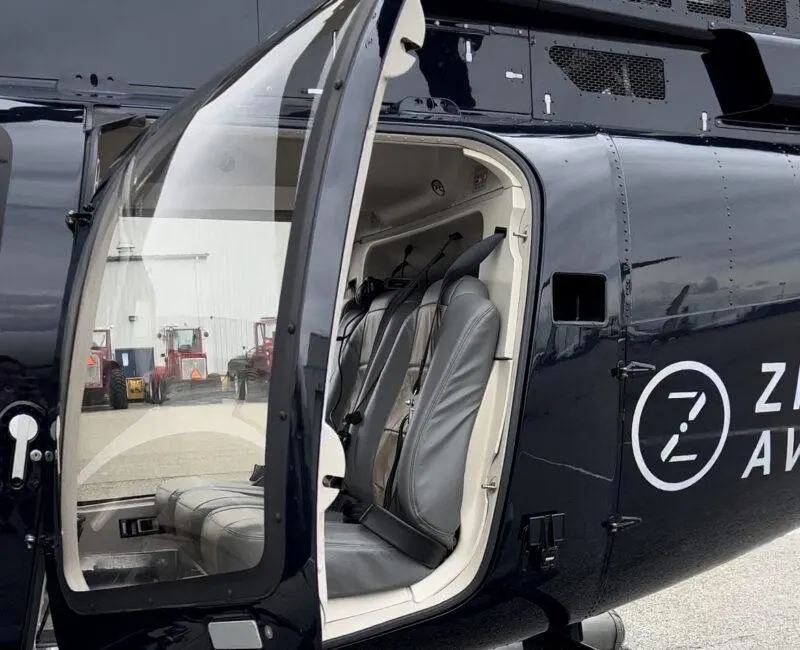 Blade helicopter parked with open door