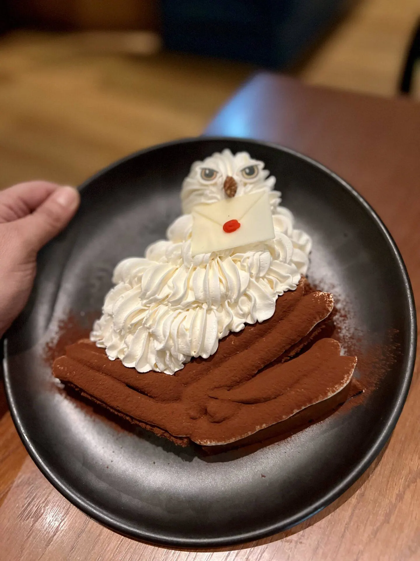 Cake made of whipped cream resembling owl