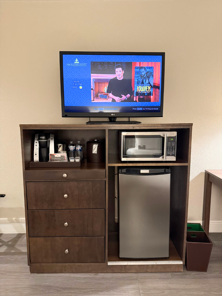 TV above microwave and mini fridge