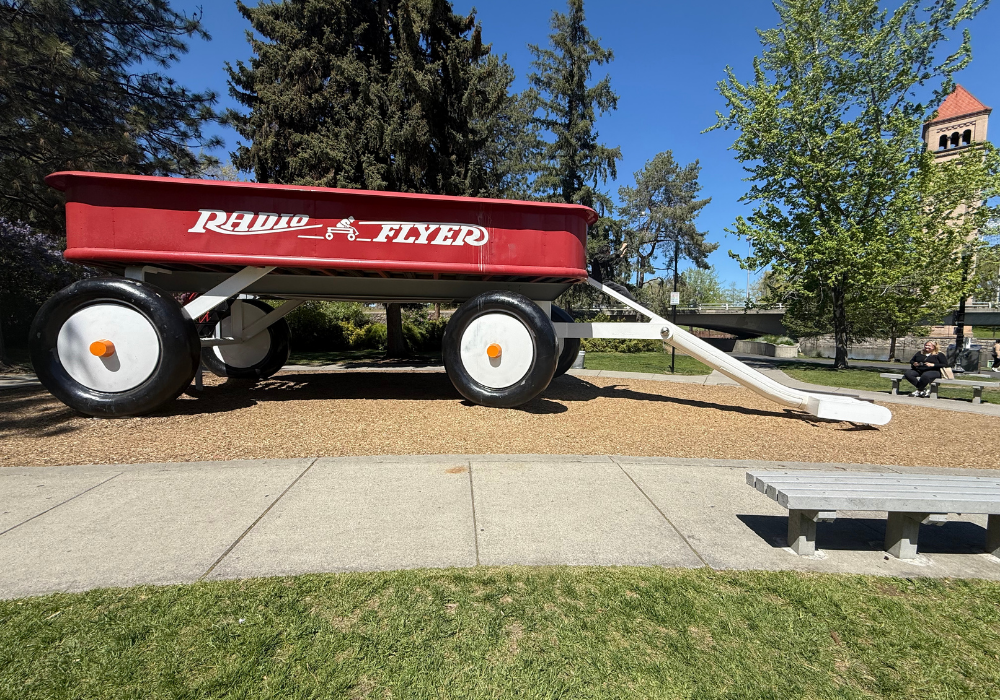 Giant red wagon with white handle
