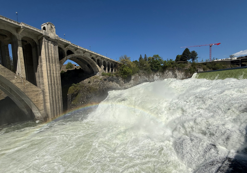 Waterfall with full rainbow