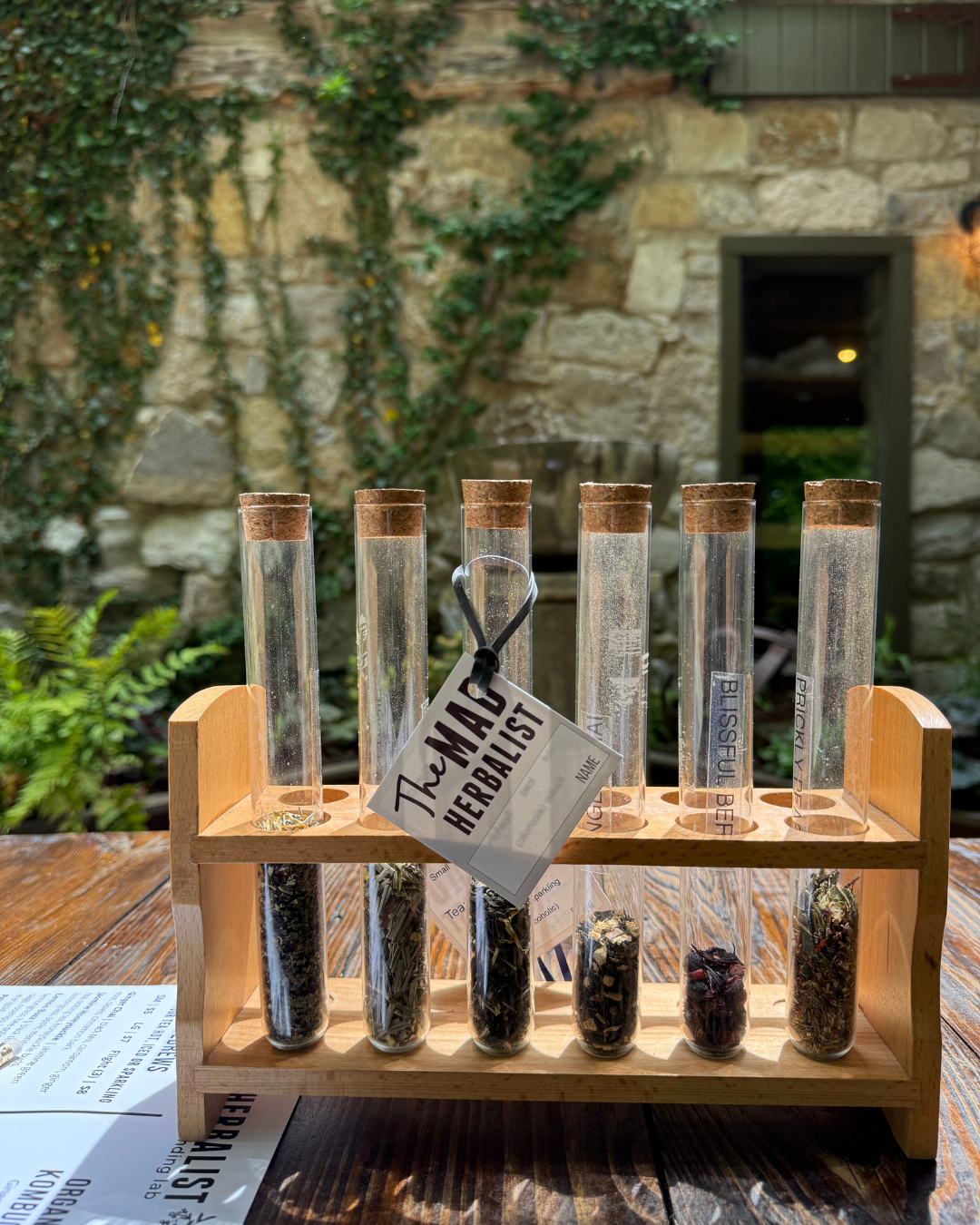 Beakers full of tea against stone backdrop