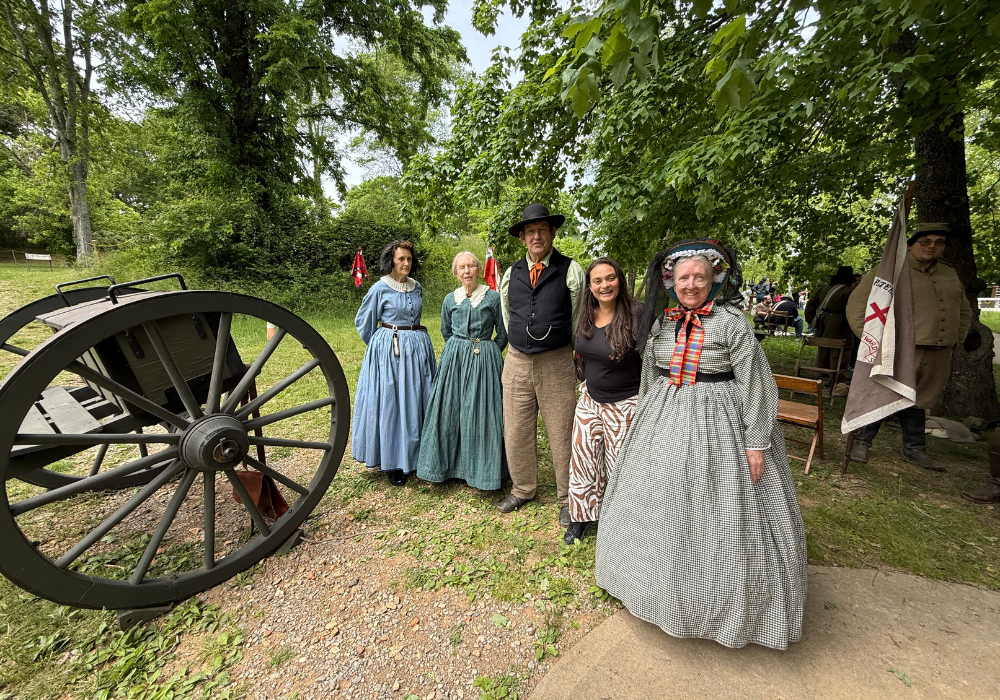 Posing with people dressed in period costumes