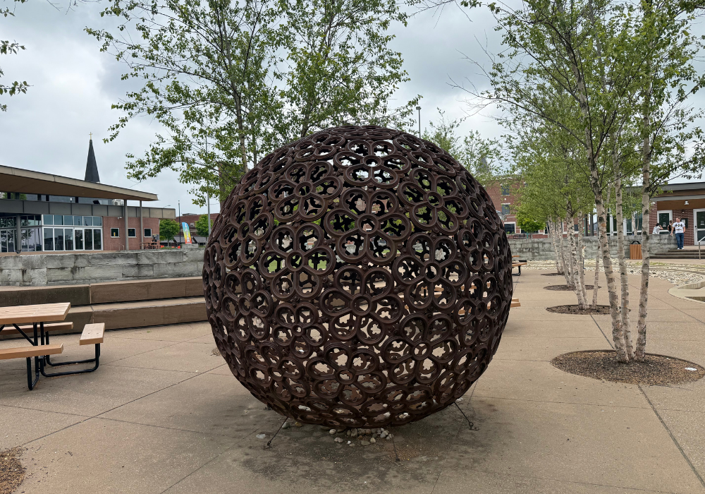 Giant sphere statue in park