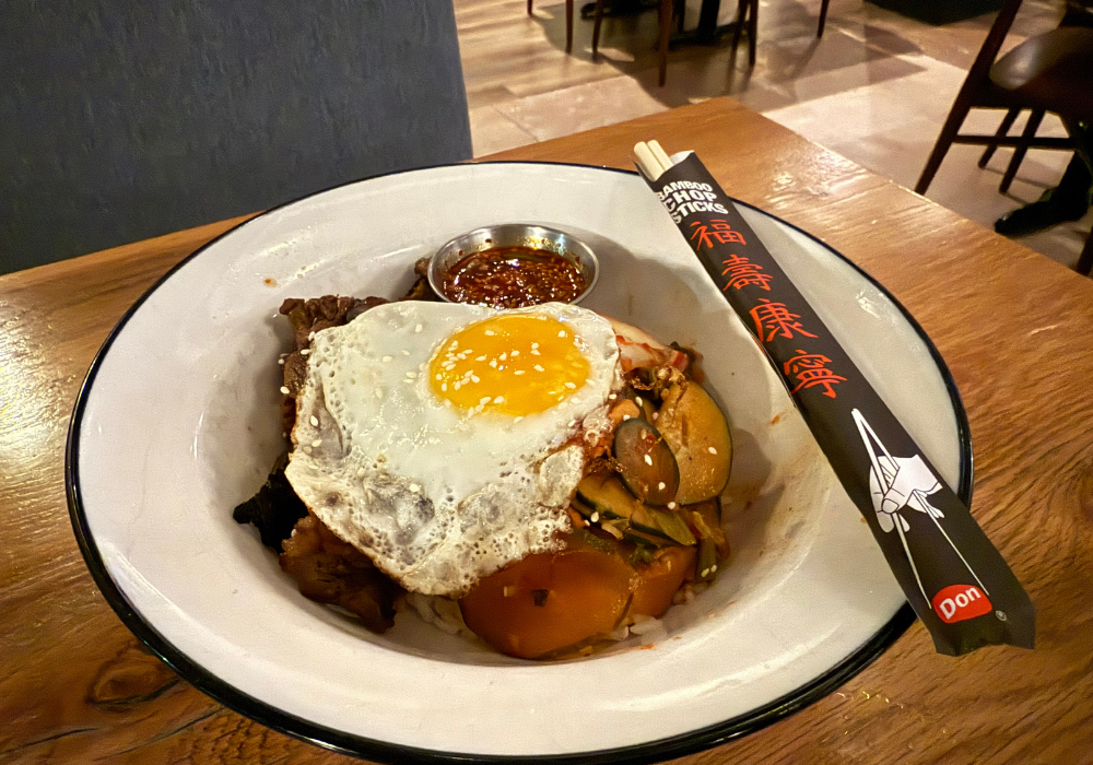 Korean beef bowl with chopsticks on top