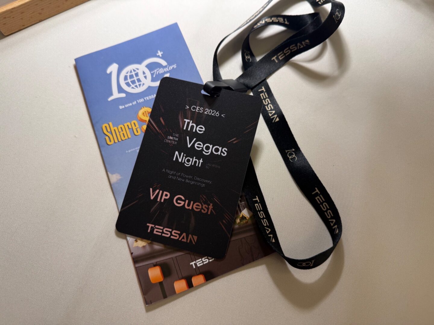 Entry badge and brochure on table