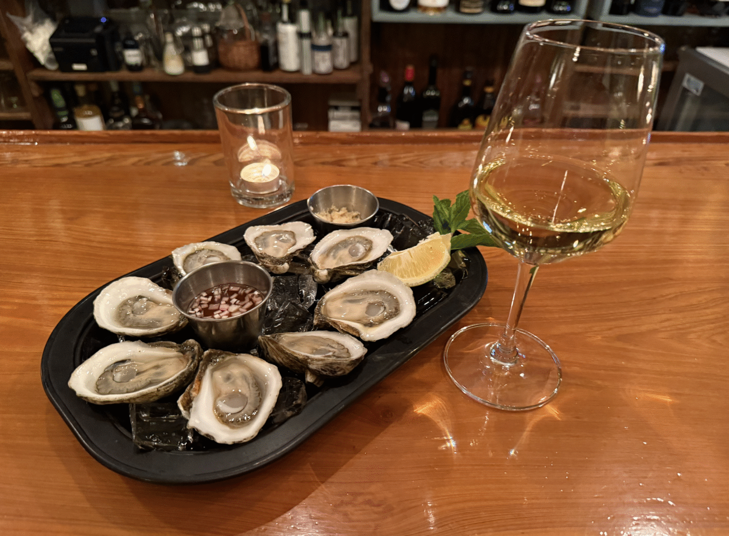 Oysters and wine at a restaurant